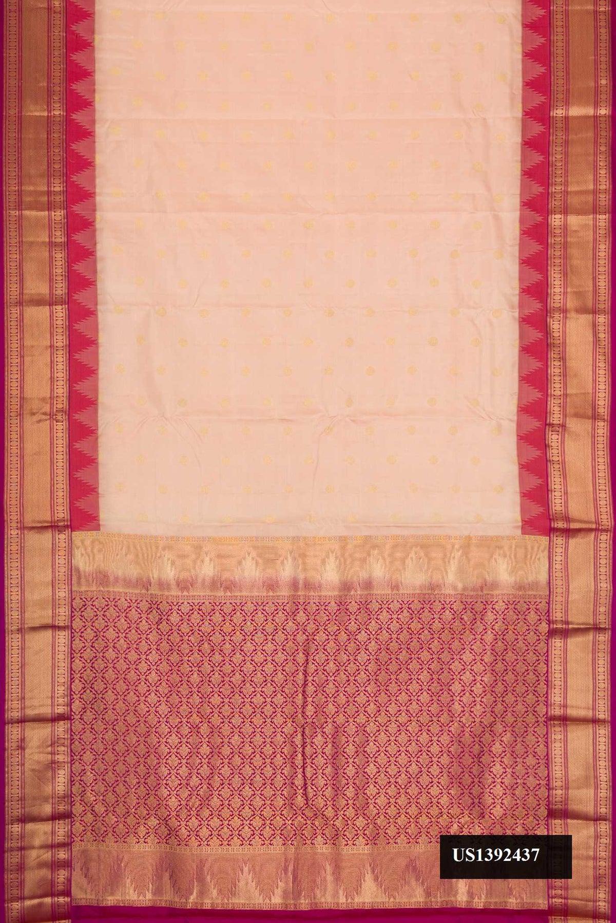 Rose Gold Dual Tone Kanchipuram Silk Saree with Zari Butta on the body and Zari Border.  displayed on a mannequin
