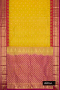 Mehandi Green Dual Tone Kanchipuram Silk Saree with Zari Butta on the body and Zari Border.  displayed on a mannequin