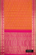 Brick Orange Dual Tone Kanchipuram Silk Saree with Zari Butta on the body and Zari Border.  displayed on a mannequin