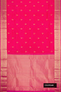Pink Dual Tone Kanchipuram Silk Saree with Zari Butta on the body and Zari Border.  displayed on a mannequin