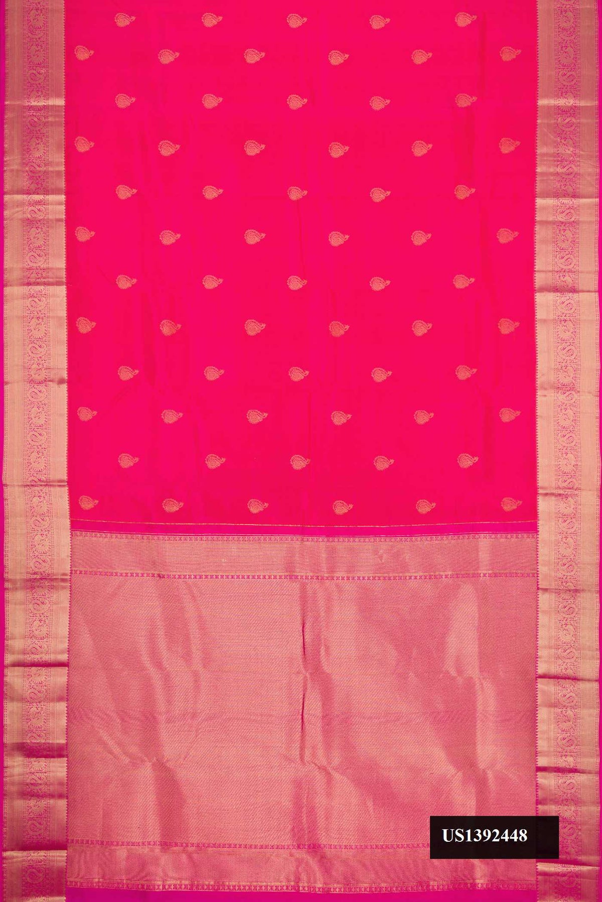 Pink Dual Tone Kanchipuram Silk Saree with Zari Butta on the body and Zari Border.  displayed on a mannequin