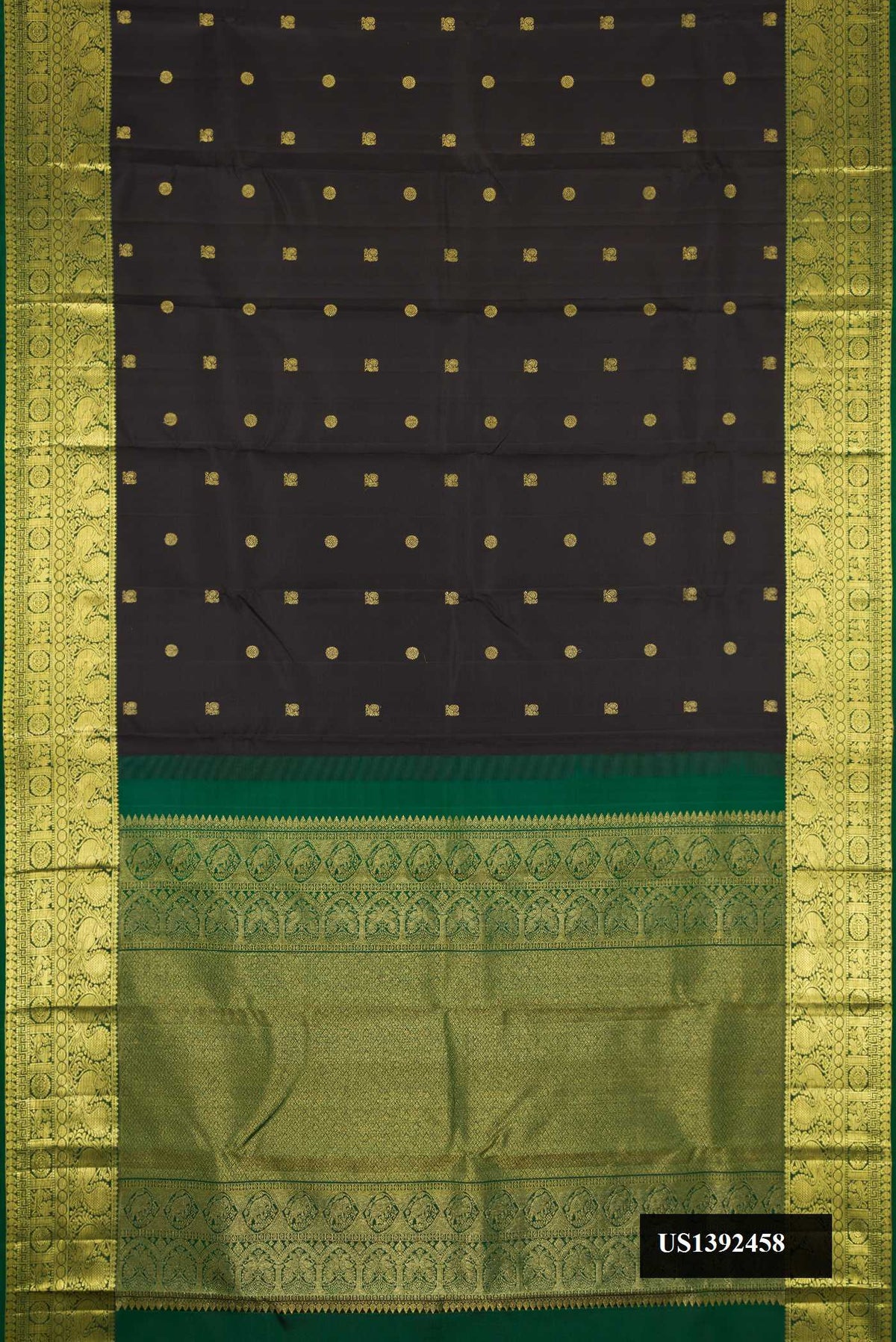 Black Dual Tone Kanchipuram Silk Saree with Zari Butta on the body and Zari Border.  displayed on a mannequin