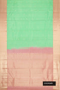 Light Green Dual Tone Kanchipuram Silk Saree with Zari Butta on the body and Zari Border.  displayed on a mannequin
