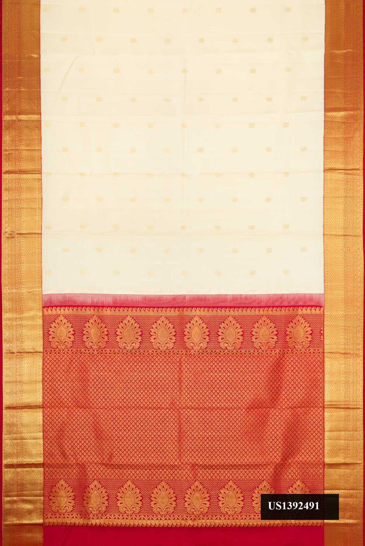 Sandal Dual Tone Kanchipuram Silk Saree with Zari Butta on the body and Zari Border.  displayed on a mannequin