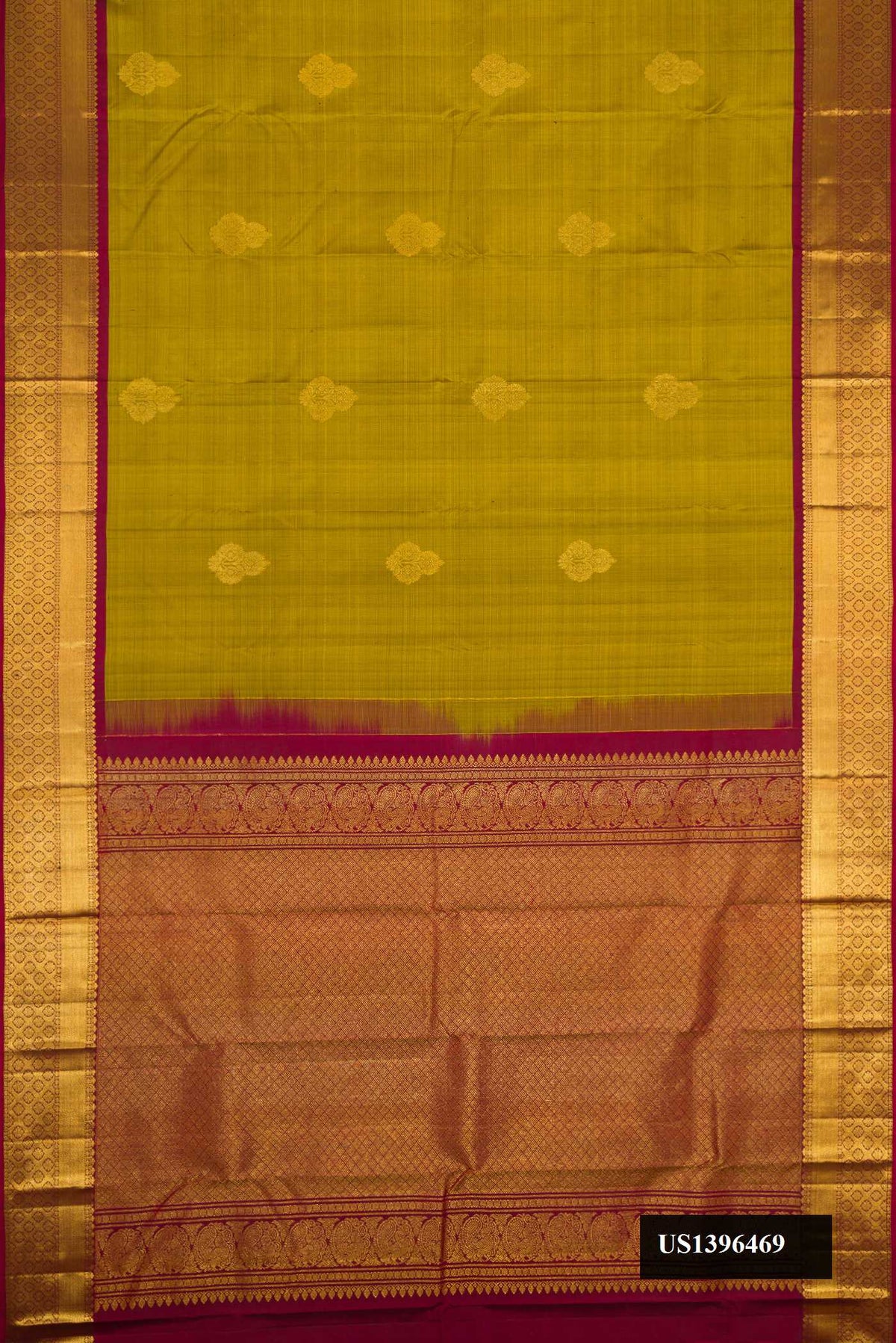 Mehandi Green Dual Tone Kanchipuram Silk Saree with Zari Butta on the body and Zari Border.  displayed on a mannequin