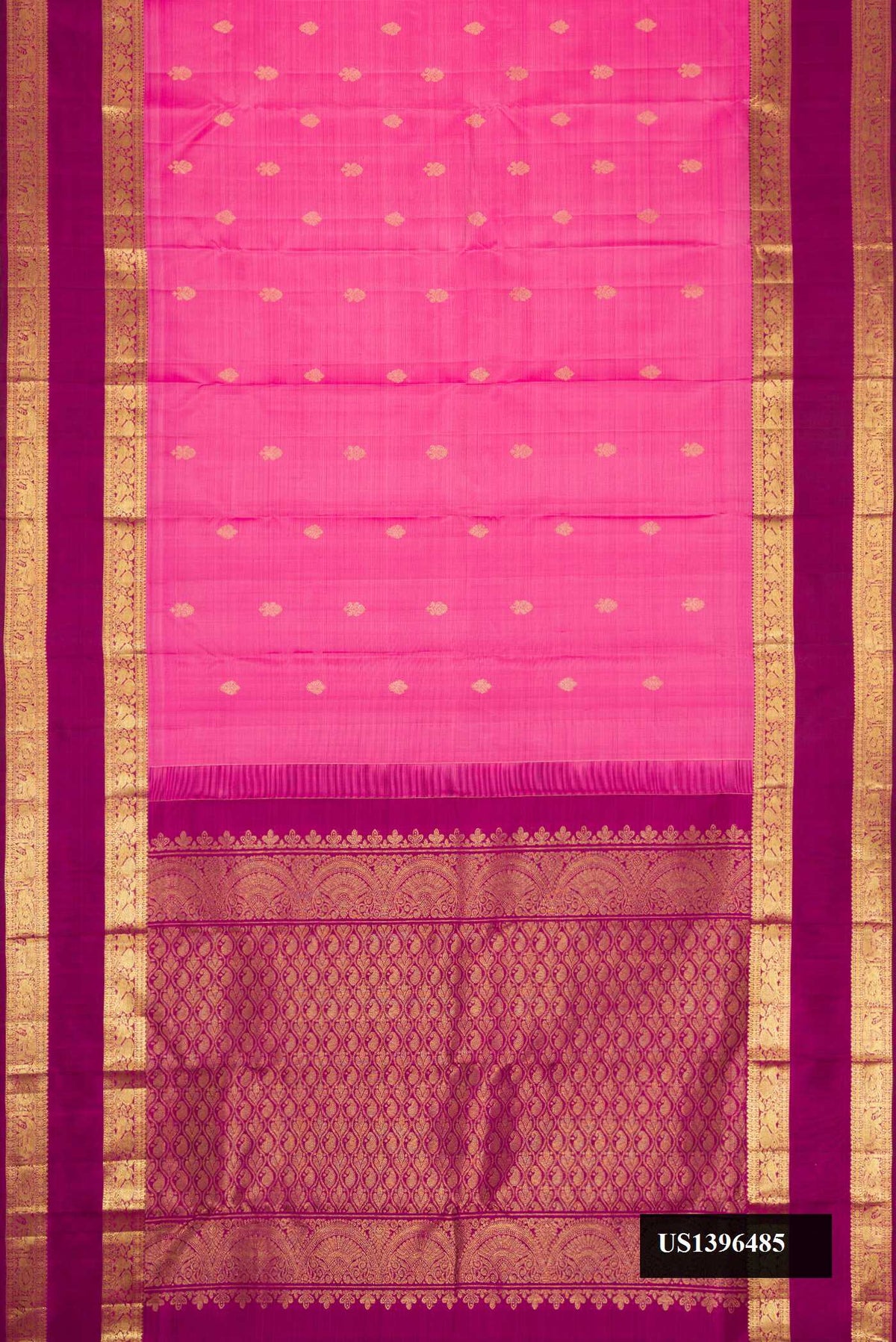 Pink Dual Tone Kanchipuram Silk Saree with Zari Butta on the body and Zari Border.  displayed on a mannequin