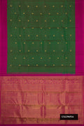 Green Dual Tone Kanchipuram Silk Saree with Zari Butta on the body and Plain Border.  displayed on a mannequin
