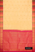Cream Dual Tone Kanchipuram Silk Saree with Zari Butta on the body and Zari Border.  displayed on a mannequin