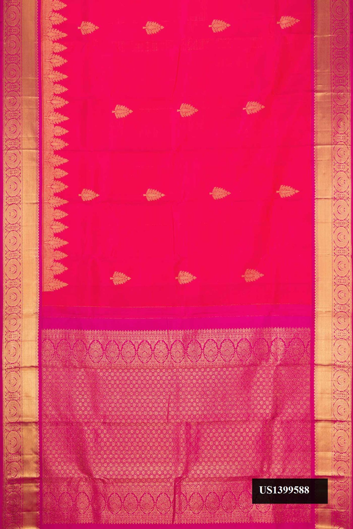 Coral Dual Tone Kanchipuram Silk Saree with Zari Butta on the body and Zari Border.  displayed on a mannequin