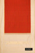 Maroon and Mustard Dual Tone Kanchipuram Silk Saree with Stripes on the body and Zari Border.  displayed on a mannequin