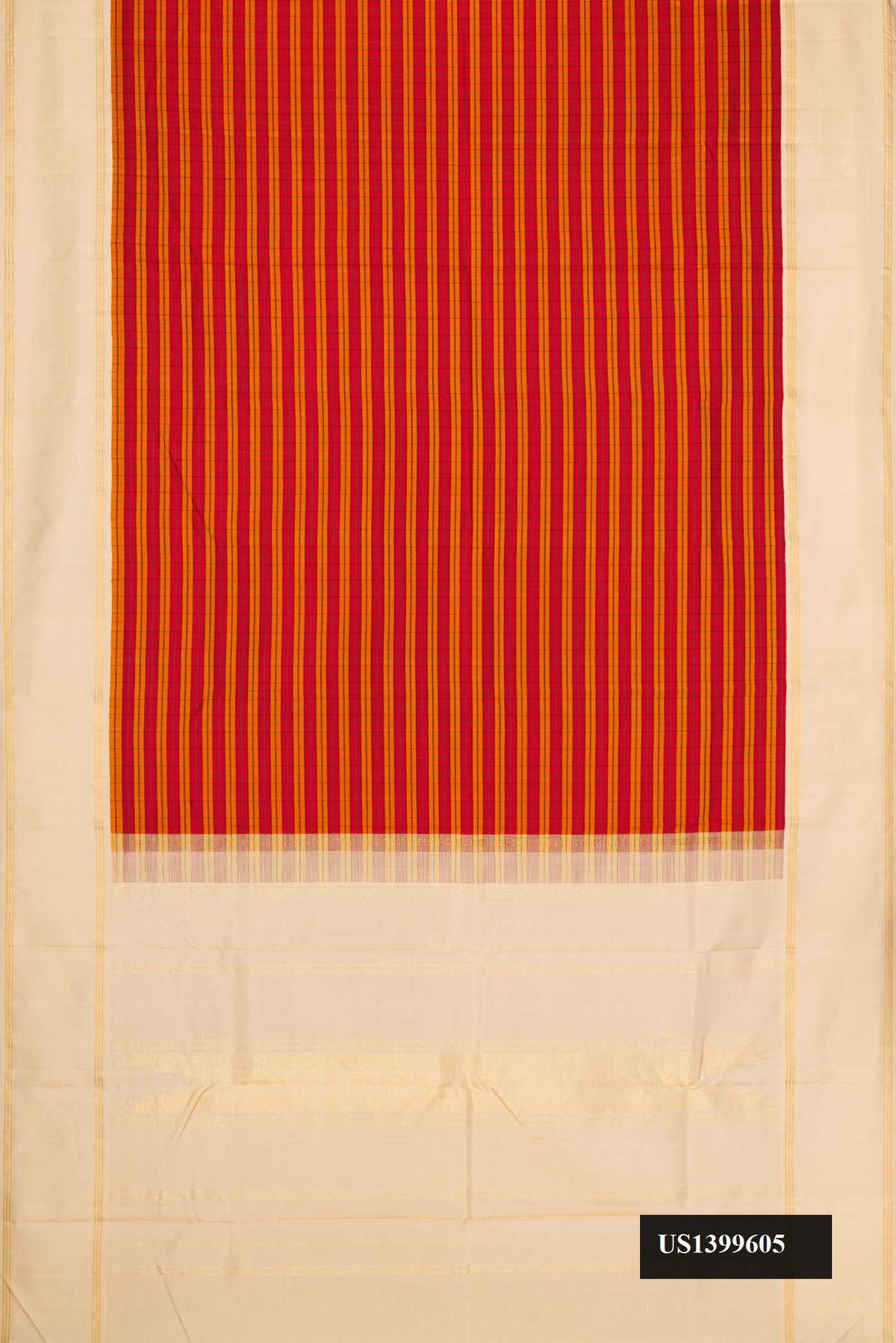 Maroon and Mustard Dual Tone Kanchipuram Silk Saree with Stripes on the body and Zari Border.  displayed on a mannequin
