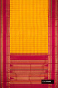 Mustard Dual Tone Kanchipuram Silk Saree with Checked design on the body and Zari Border.  displayed on a mannequin