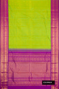 Parrot Green Dual Tone Kanchipuram Silk Saree with Zari Butta on the body and Zari Border.  displayed on a mannequin