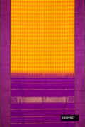 Mustard Dual Tone Kanchipuram Silk Saree with Checked design on the body and Checks Border.  displayed on a mannequin