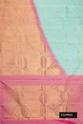 Sea Green Dual Tone Kanchipuram Silk Saree with Zari Butta on the body and Rising Temple Border.  displayed on a mannequin