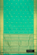 Sea Green Dual Tone Kanchipuram Silk Saree with Stripes on the body and Zari Border.  displayed on a mannequin