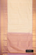 Sandal Dual Tone Kanchipuram Silk Saree with Zari Brocade on the body and Zari Border.  displayed on a mannequin