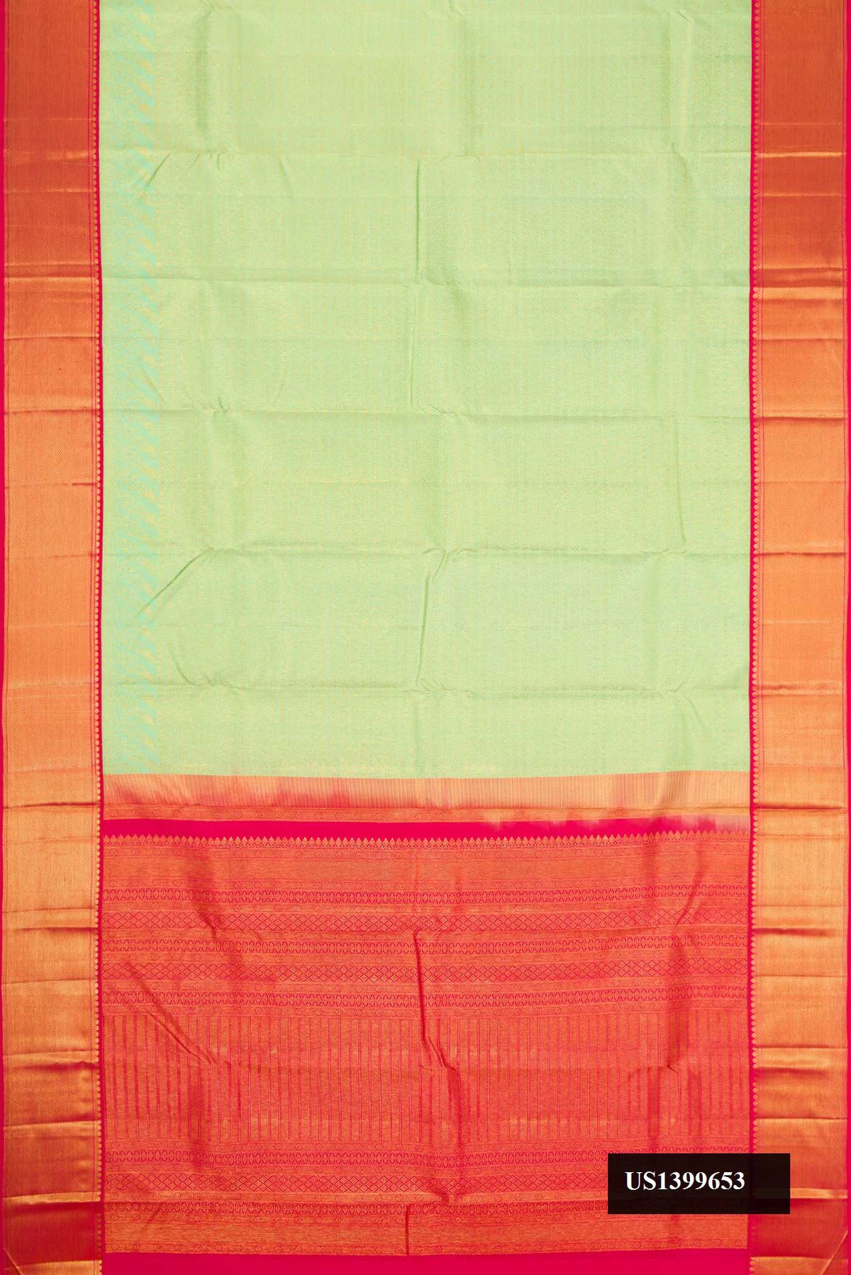 Pista Green Dual Tone Kanchipuram Silk Saree with Zari Brocade on the body and Zari Border.  displayed on a mannequin