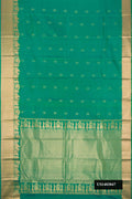 Sage Green Dual Tone Kanchipuram Silk Saree with Zari Butta on the body and Zari Border.  displayed on a mannequin