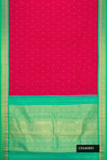 Pink Dual Tone Kanchipuram Silk Saree with Zari Butta on the body and Zari Border.  displayed on a mannequin