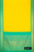 Yellow Dual Tone Kanchipuram Silk Saree with Zari Butta on the body and Zari Border.  displayed on a mannequin