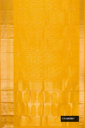 Yellow Dual Tone Kanchipuram Silk Saree with Zari Brocade on the body and Zari Border.  displayed on a mannequin