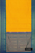 Mustard Dual Tone Kanchipuram Silk Saree with Zari Brocade on the body and Zari Border.  displayed on a mannequin