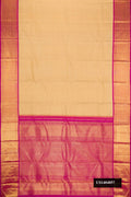 Dark Beige Dual Tone Kanchipuram Silk Saree with Zari Brocade on the body and Zari Border.  displayed on a mannequin