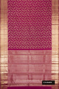 Magenta Dual Tone Kanchipuram Silk Saree with Zari Brocade on the body and Zari Border.  displayed on a mannequin