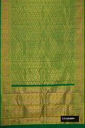 Green Dual Tone Kanchipuram Silk Saree with Zari Brocade on the body and Zari And Thread Border.  displayed on a mannequin
