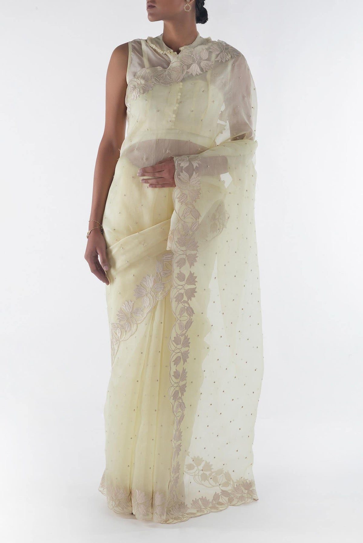 Piety of a Lili Cream floral design saree from Embroidered Romance Collection by Nalli