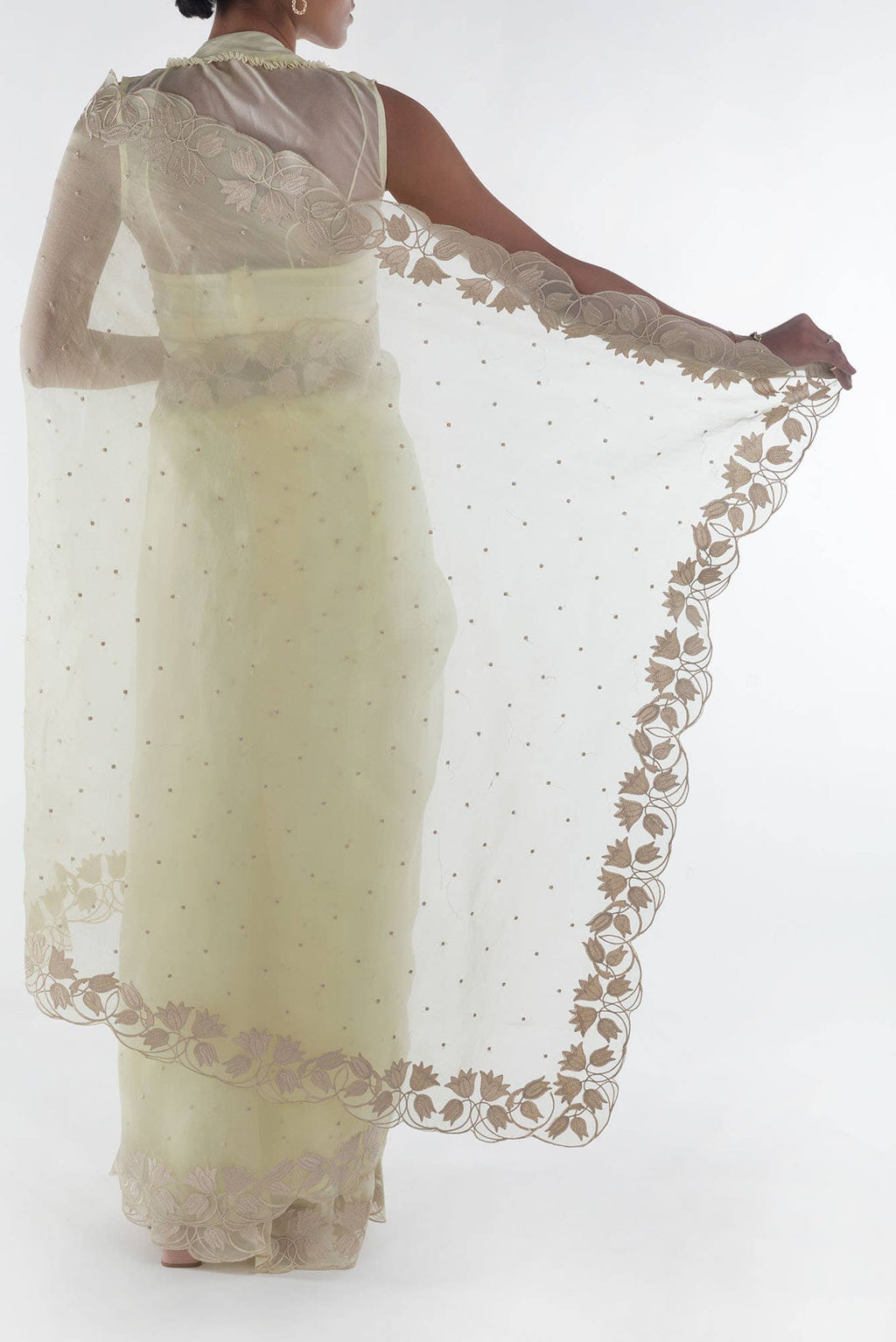 Piety of a Lili Cream floral design saree from Embroidered Romance Collection by Nalli
