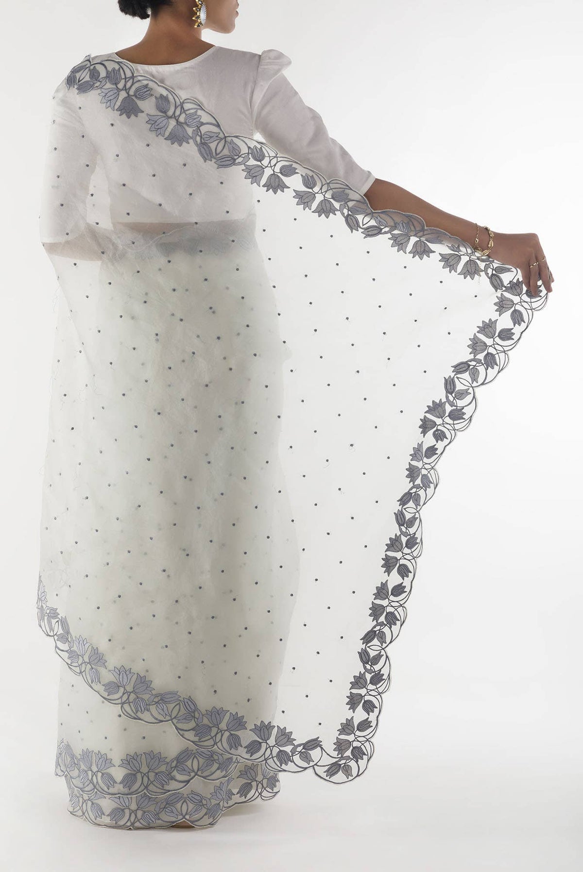 Piety of a Lili White floral design saree from Embroidered Romance Collection by Nalli